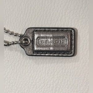 COACH Silver Metallic Hang Tag